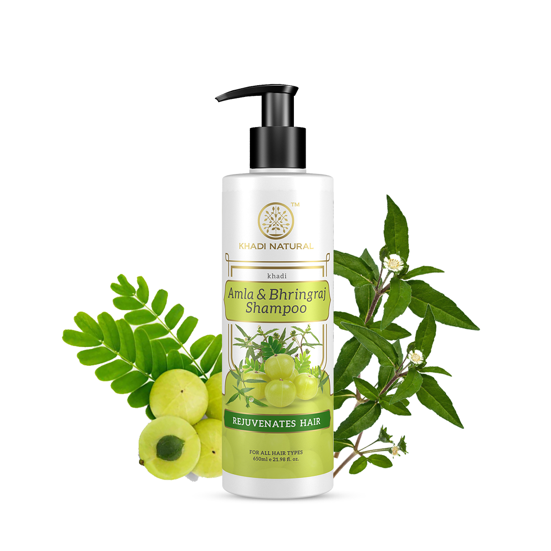 Shampoo bottle with Amla and Bhringraj ingredients on a white background