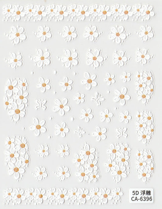 A sheet of 5D self-adhesive nail art stickers featuring a floral pattern with white and gold flowers.