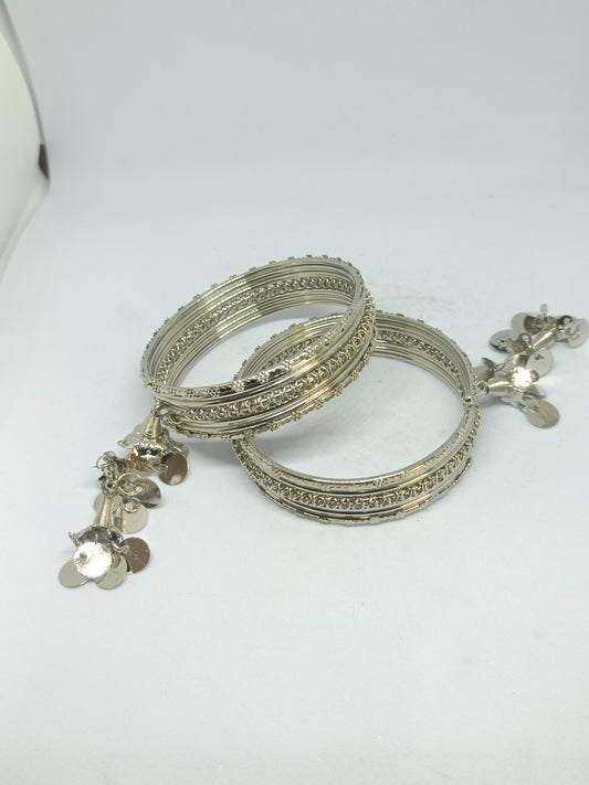Pair of Elegant Oxidised Layered Bangle Set with Intricate Detailing & Dangling Charms