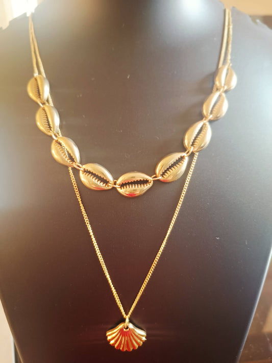 A dull-gold-plated double-layered sea shell neckpiece displayed on a mannequin bust.