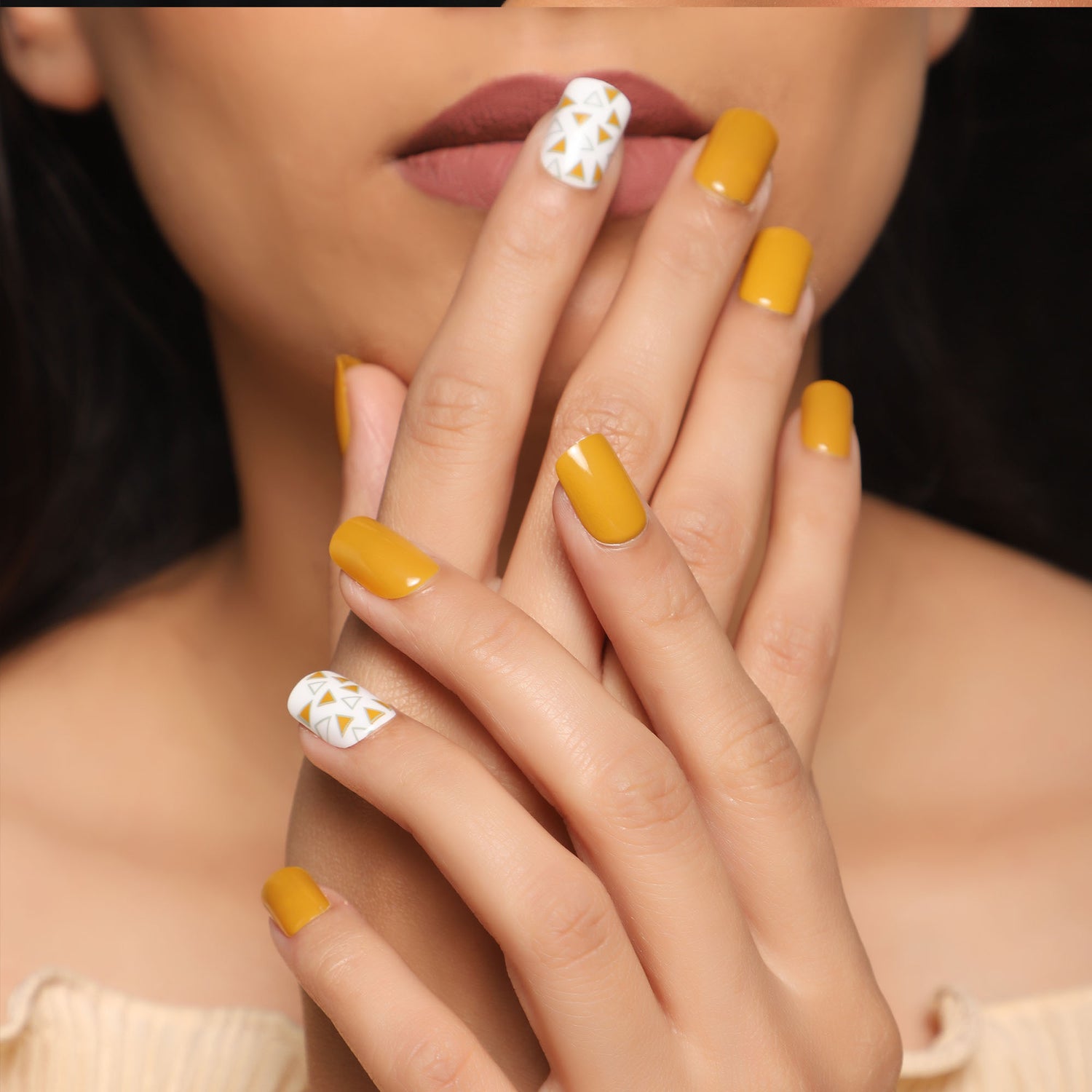 Premium Photo | Yellow and black on nails young lady hands with manicured  nail art design dark yellow color nails0